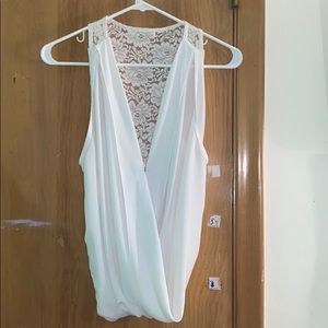 White blouse with floral back.